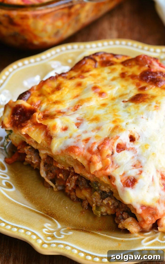 Ultimate Italian Sausage Lasagna 7 A final close-up of a serving of Italian Sausage Lasagna on a plate, ready to be enjoyed.