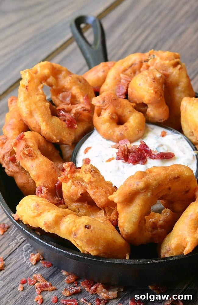 My 2015 Recipe Countdown: Sweet and Savory Favorites 3 Bacon Onion Rings with Bacon Ranch Dipping Sauce recipe from Will Cook For Smiles, a unique and savory snack or appetizer.