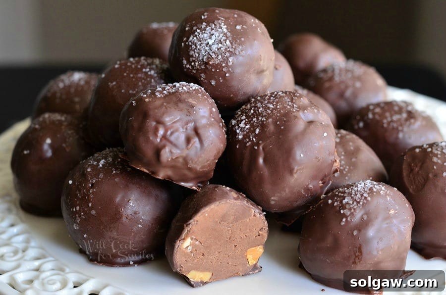 Salted Almond Fudge Truffles stacked on a platter 