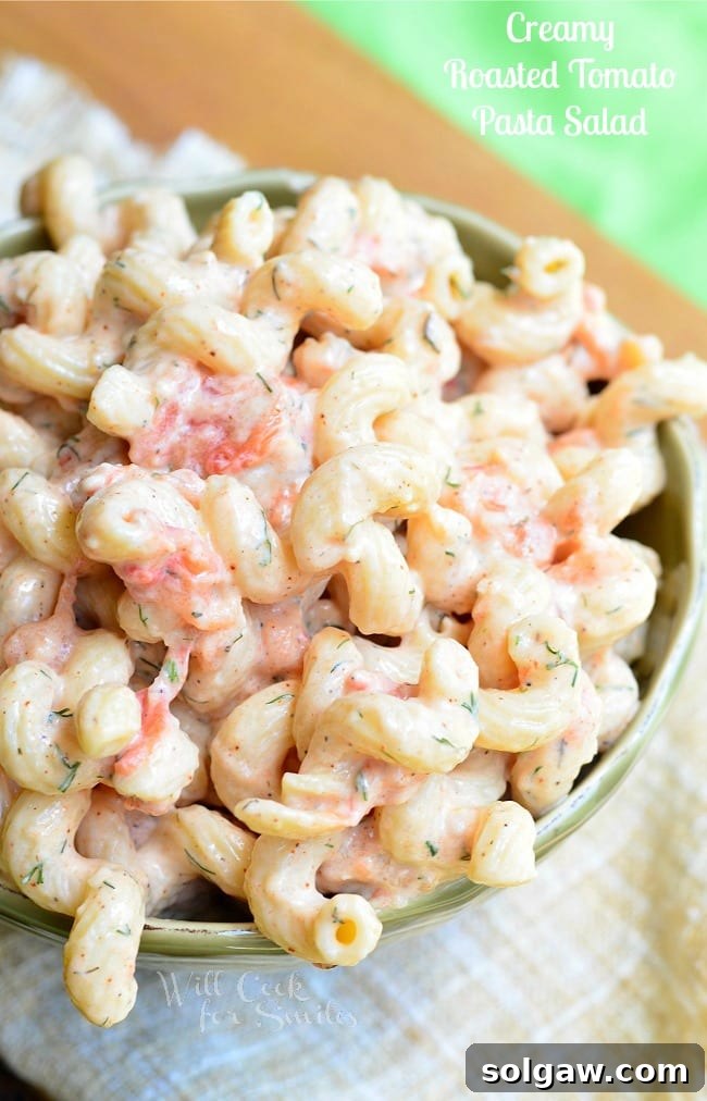 Creamy Roasted Tomato Pasta Salad in a bowl, a fresh and vibrant dish.