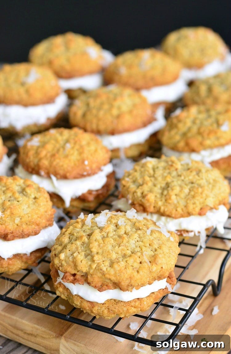 Delicious Coconut Oatmeal Cookie Sandwiches on a cooling rack