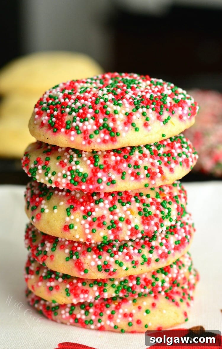 Zesty Orange & Vanilla Bean Sugar Cookies 3 Plate of soft and chewy vanilla orange sugar cookies, some adorned with colorful sprinkles