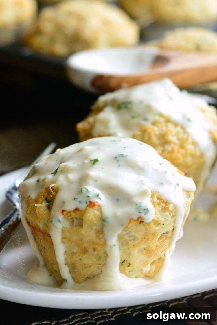 Garlic Parmesan Chicken Mini Meatloaves. Juicy, flavorful chicken meatloaves topped with an addicting creamy Parmesan sauce. These individual meatloaves are perfect for dinner or an after-school snack.