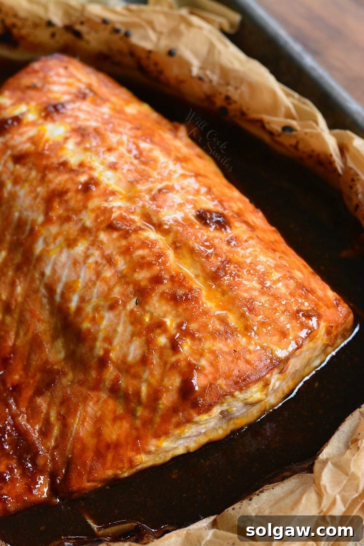 Simple Zesty Orange Salmon 2 4-Ingredient Orange Salmon in butcher paper on a baking sheet