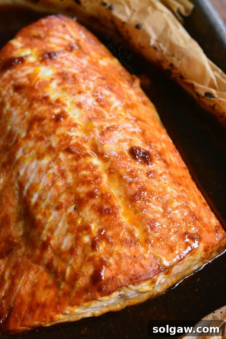 Simple Zesty Orange Salmon 4 4-Ingredient Orange Salmon in butcher paper on a baking sheet