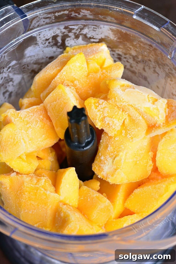 Frozen Mango in a food processor.