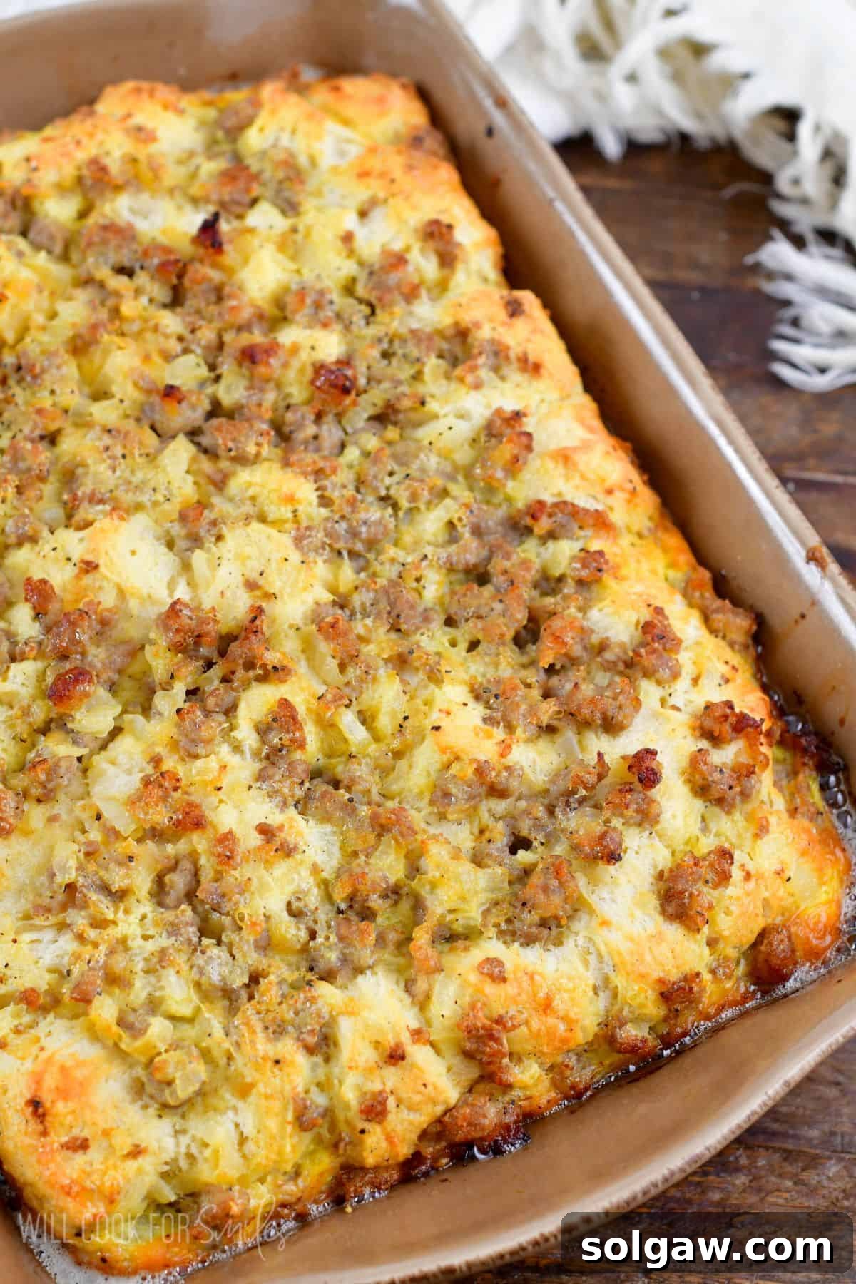 Hearty Sausage & Egg Breakfast Bake 9 sausage breakfast casserole in a casserole dish.
