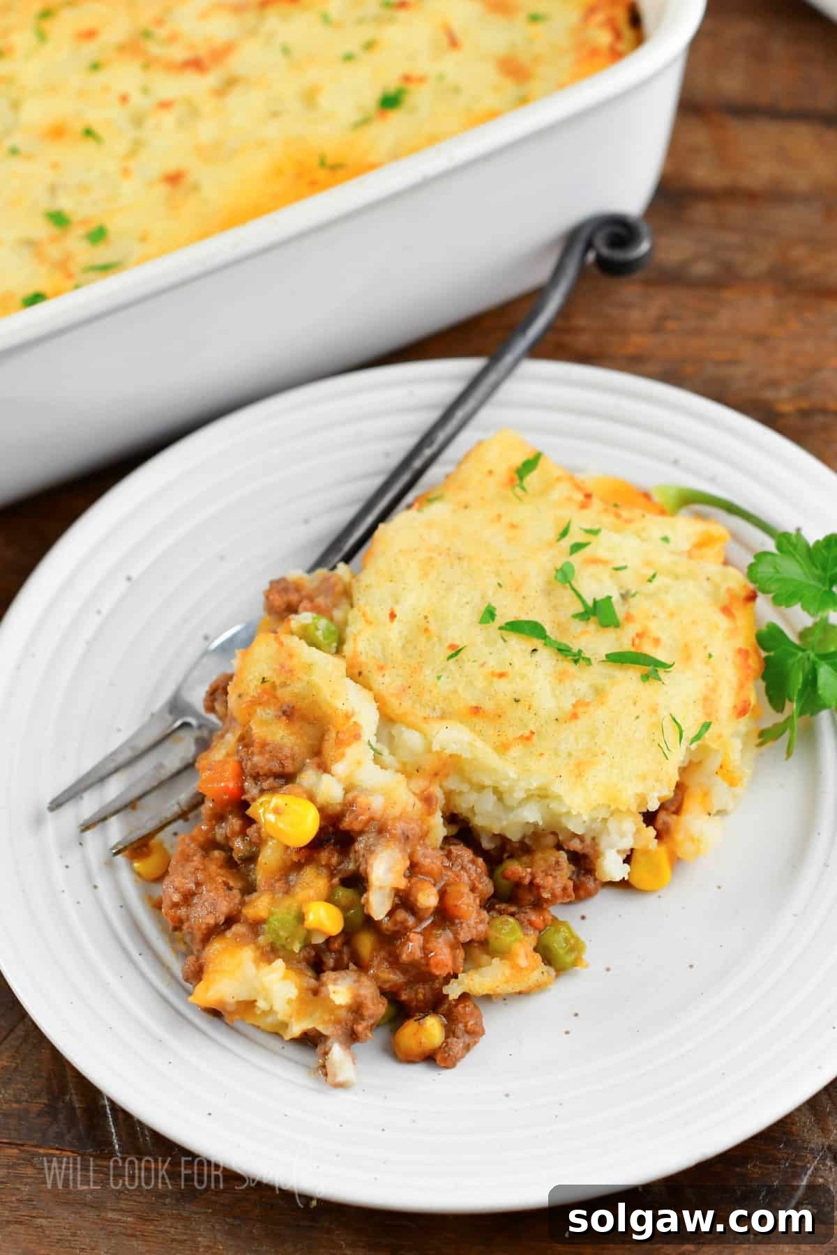 Hearty Shepherd's Pie: A Comfort Food Classic 10 some shepherd's pie in a dish with a fork.