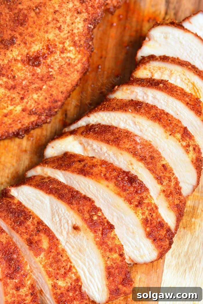 Baked Chicken sliced on cutting board