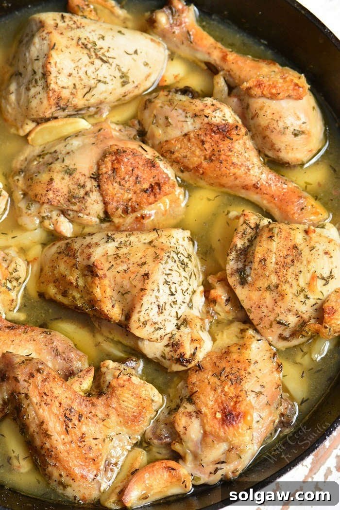 Savory Garlic Chicken 7 Final presentation of garlic chicken, bathed in golden sauce, garnished with fresh parsley, embodying a perfect homemade meal.