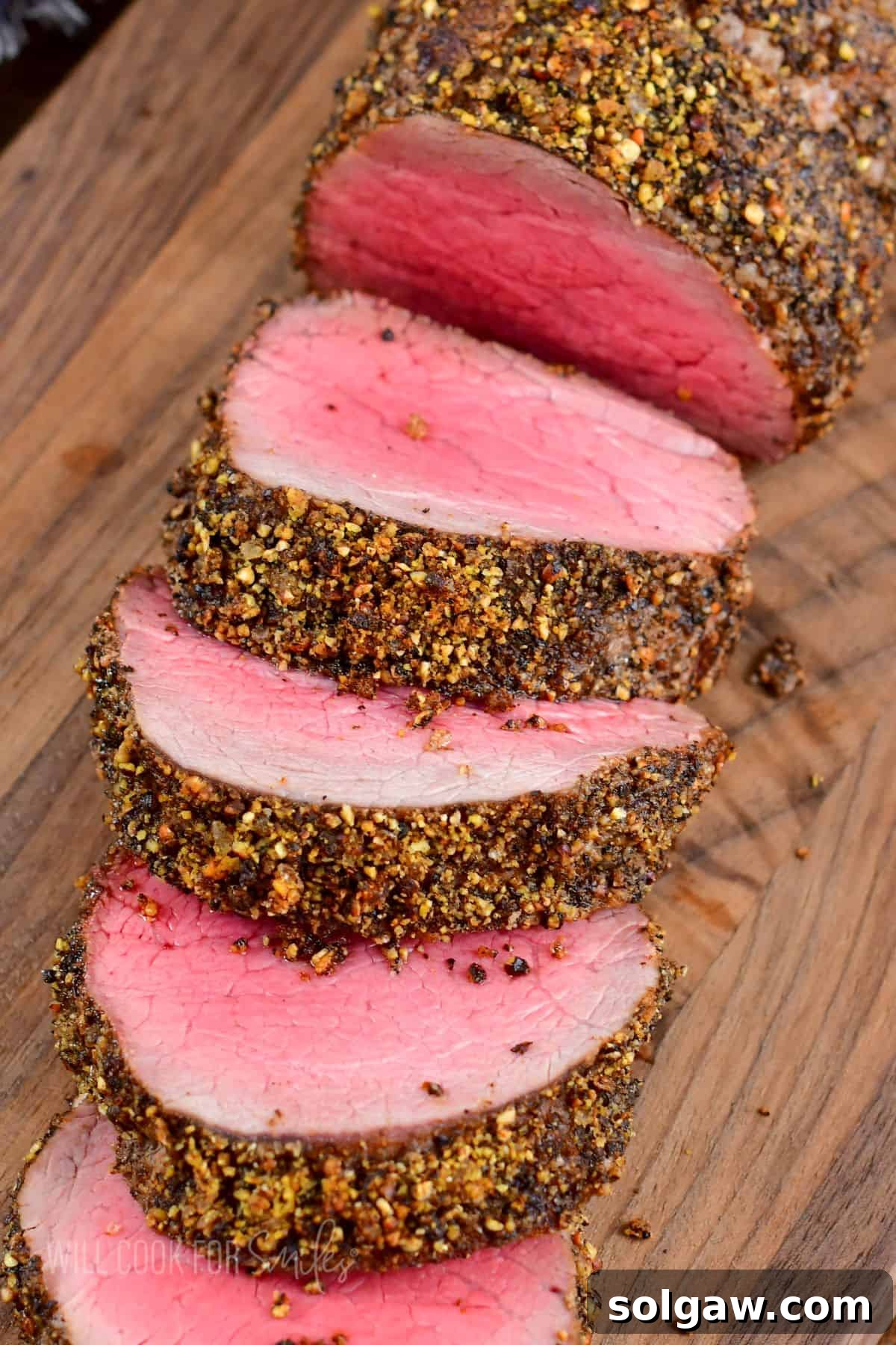 sliced beef tenderloin coated in peppercorn seasoning.