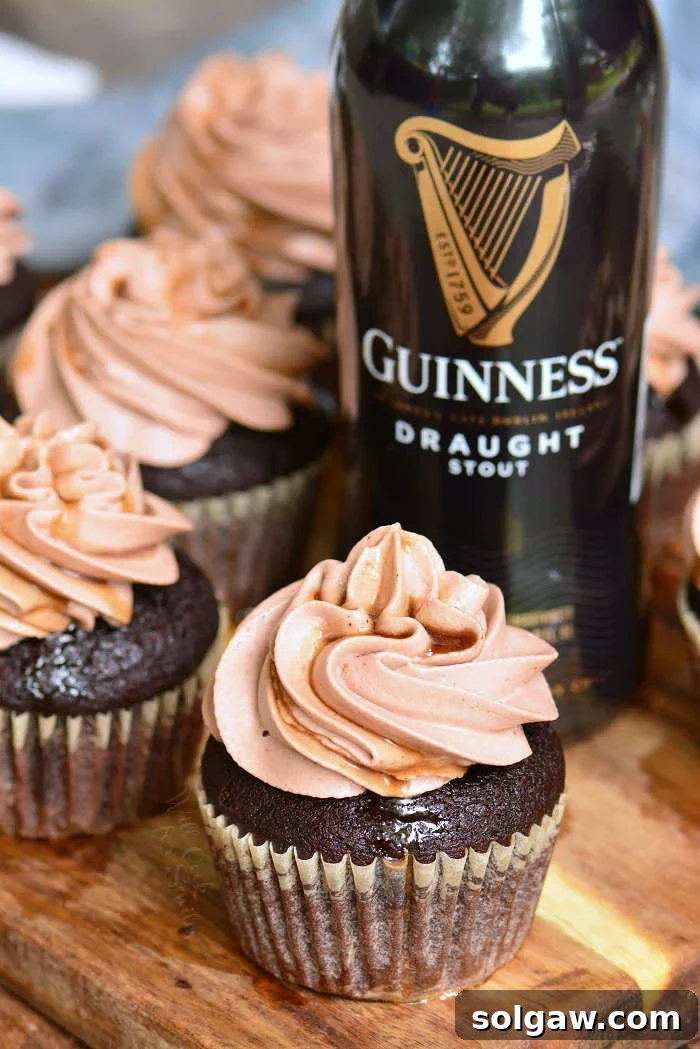 beer cupcakes on a cutting board with bottle of beer 