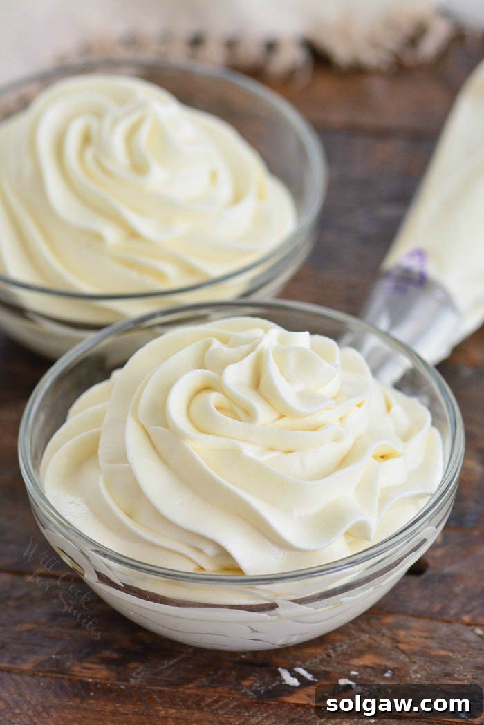 Classic vanilla cream cheese frosting swirled on cupcakes, ready for enjoyment.