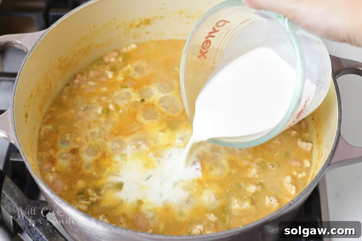 A mix of seasonings for chili in a small bowl.