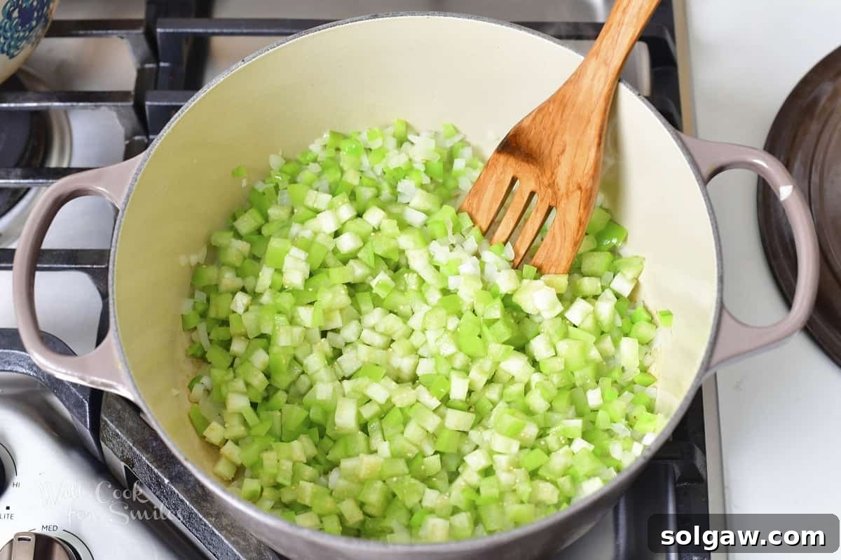 Fresh tomatillos with husks removed, ready to be diced.