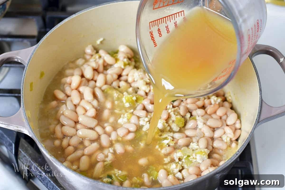Cans of cannellini and navy beans, drained and ready.