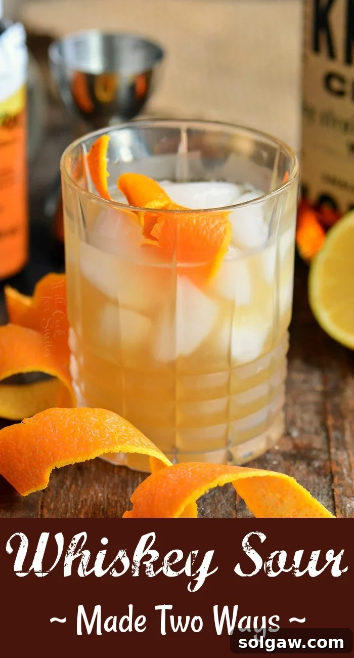 Whiskey Sour Two Takes 2 A perfectly crafted Whiskey Sour cocktail, showcasing its rich amber hue and a vibrant lemon twist garnish.