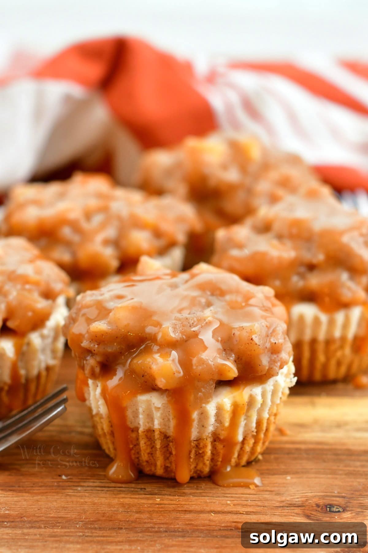 Spiced Apple Cheesecake Bites 10 close up of caramel apple filling on mini cheesecakes