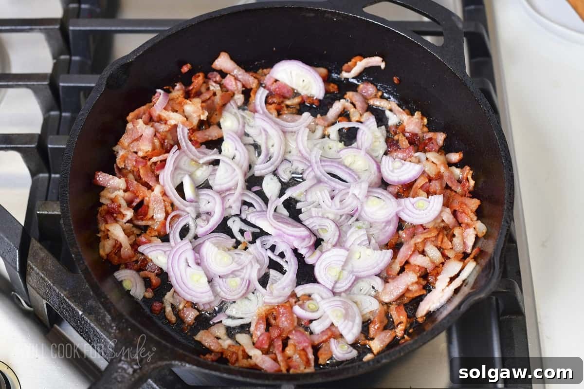 Sautéing shallots and bacon together in a skillet, filling the kitchen with an irresistible aroma.