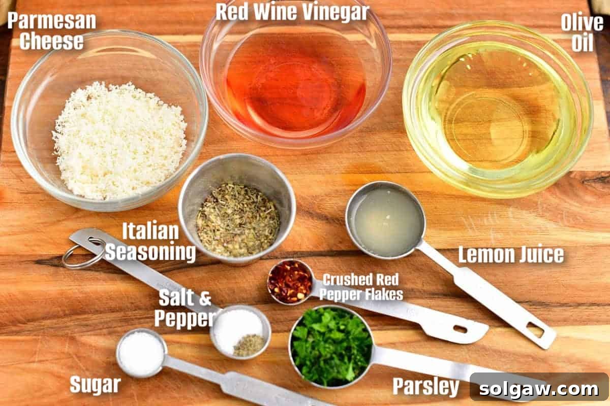Zesty Italian Vinaigrette 4 labeled ingredients to make Italian dressing in measured cups on a cutting board, highlighting fresh quality.