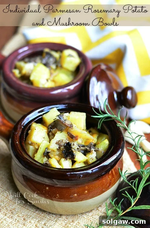 Rustic Rosemary Potato Mushroom Parmesan Bowls 4 Three individual ceramic bowls filled with Parmesan Rosemary Potato and Mushroom Bake, fresh herbs nearby