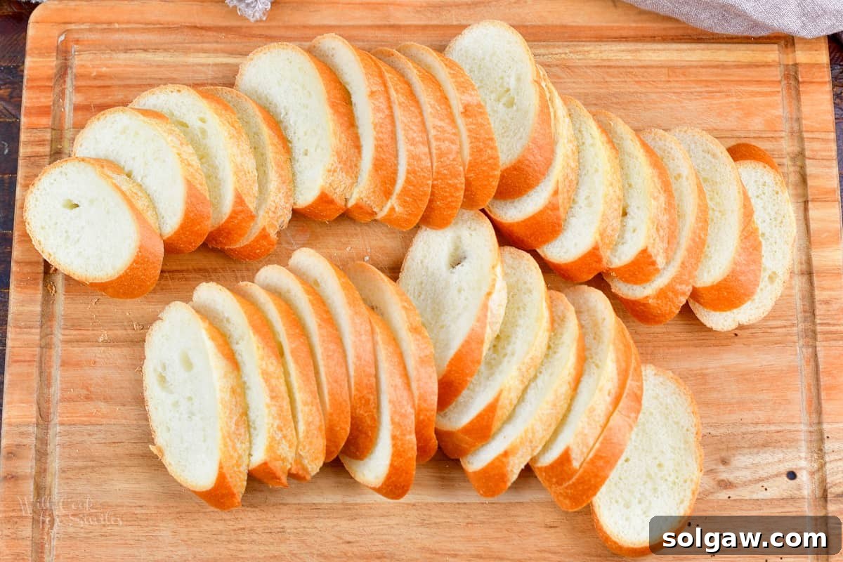 sliced baguette on a cutting board