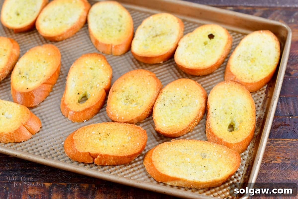 baked crostini on a baking sheet