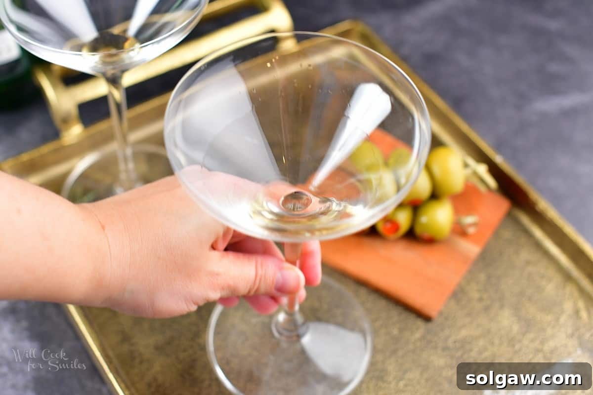 The Maverick's Martini 4 swirling vermouth in the glass