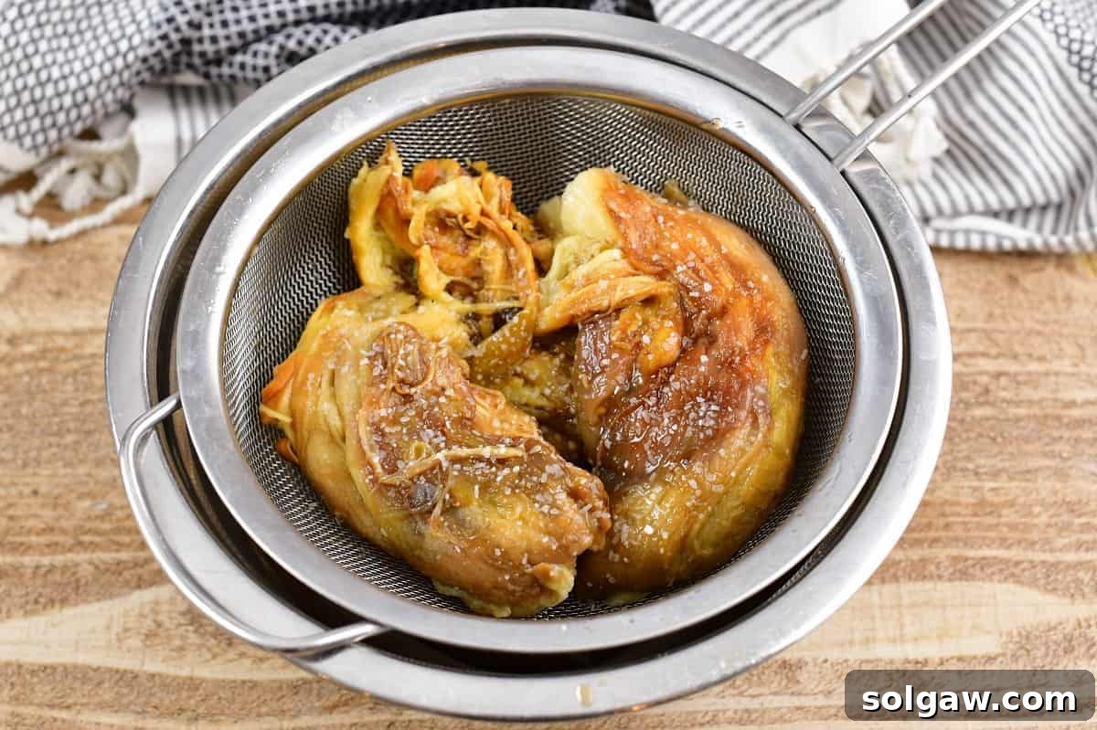 Smoky Aubergine Mezze 7 Peeled and salted eggplant flesh in a strainer to drain excess liquid