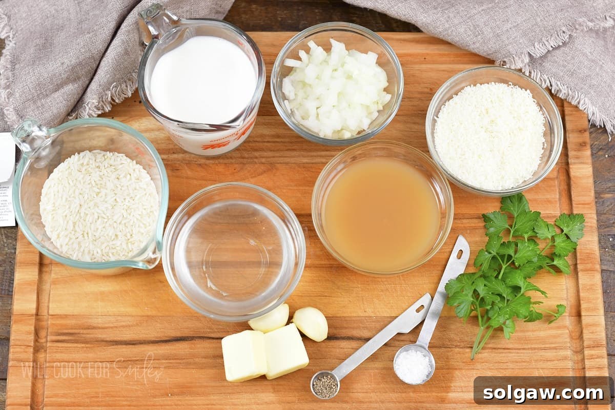 Velvety Parmesan Rice 3 Ingredients for Creamy Parmesan Rice laid out on a wooden board: rice, parmesan, garlic, onion, butter, parsley, salt, pepper.
