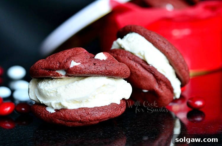 Delicious Red Velvet Ice Cream Sandwich Cookies with a cheesecake ice cream filling, ready to be enjoyed.