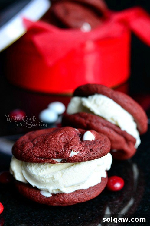 A perfectly made Red Velvet Ice Cream Sandwich Cookie, showcasing the soft cookie and generous ice cream filling.
