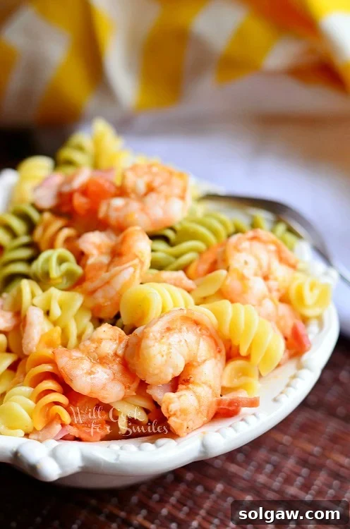 Another mouth-watering angle of the Chipotle Shrimp Bacon & Tomato Pasta Bowl, ready to be enjoyed.