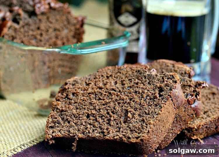 A slice of moist Chocolate Stout Bread with chocolate chips