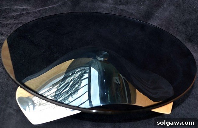 A close-up view of the elegant Nambé cake stand, showcasing its unique design and lustrous finish.