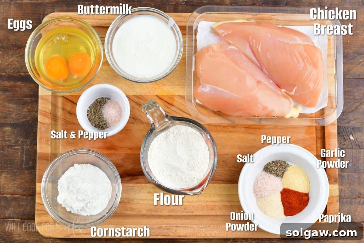 Crispy Chicken Bites 3 labeled ingredients to make boneless wings in the cutting board.