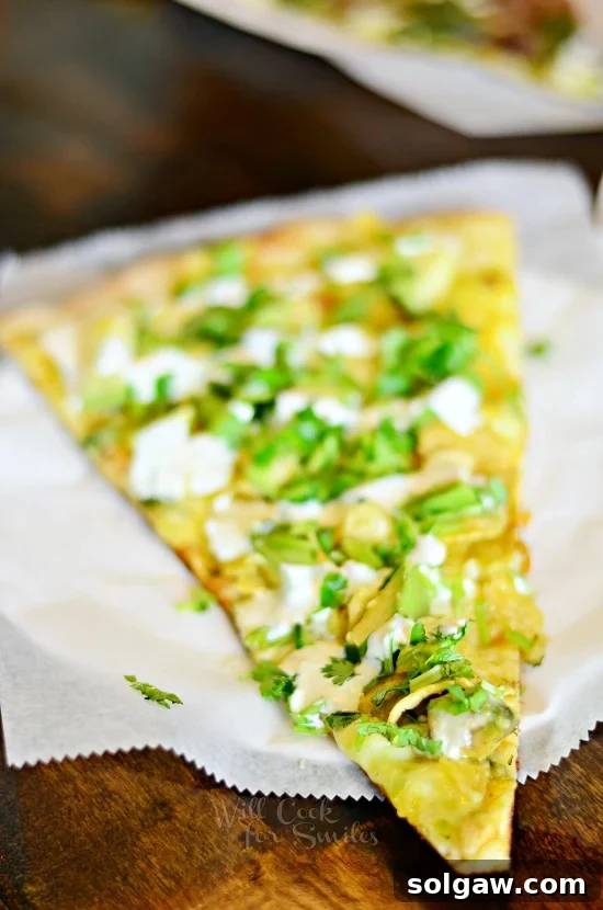 Close-up photo of the Pancho Franco pizza from Tony Boloney's in Atlantic City, showcasing grilled chicken, avocado slices, cheese, and cilantro.