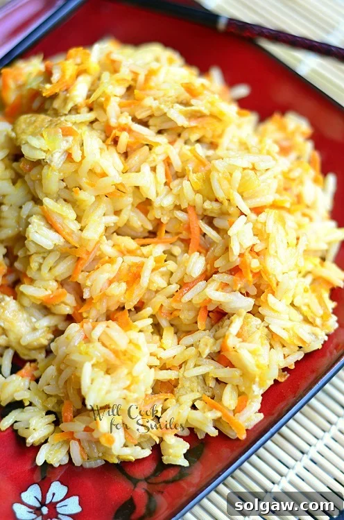 Golden Crab Stir Fry Rice 7 Khao Pad (Thai Fried Rice) image featuring fragrant rice and garnishes