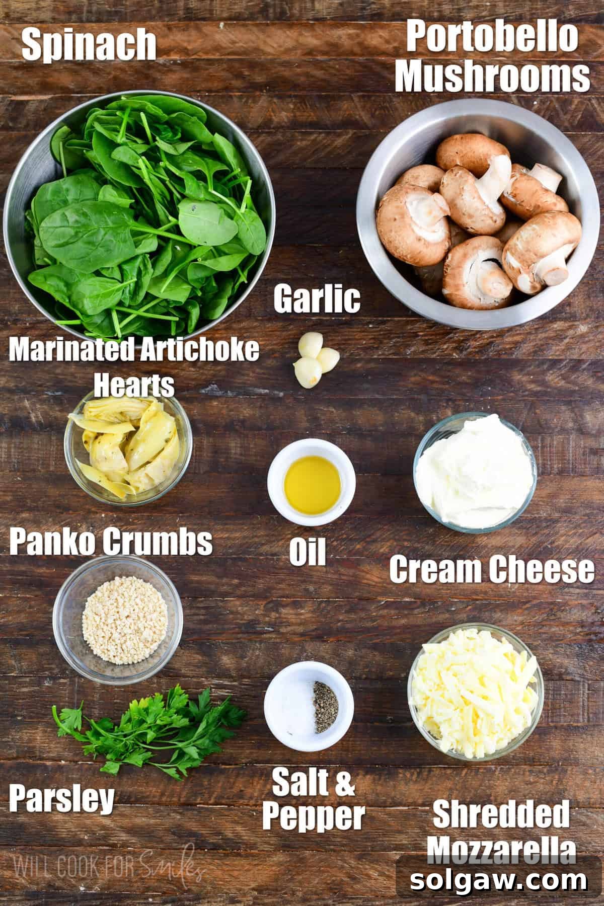 Creamy Spinach Artichoke Stuffed Mushrooms 3 labeled ingredients to make spinach artichoke stuffed mushrooms on a wooden board.
