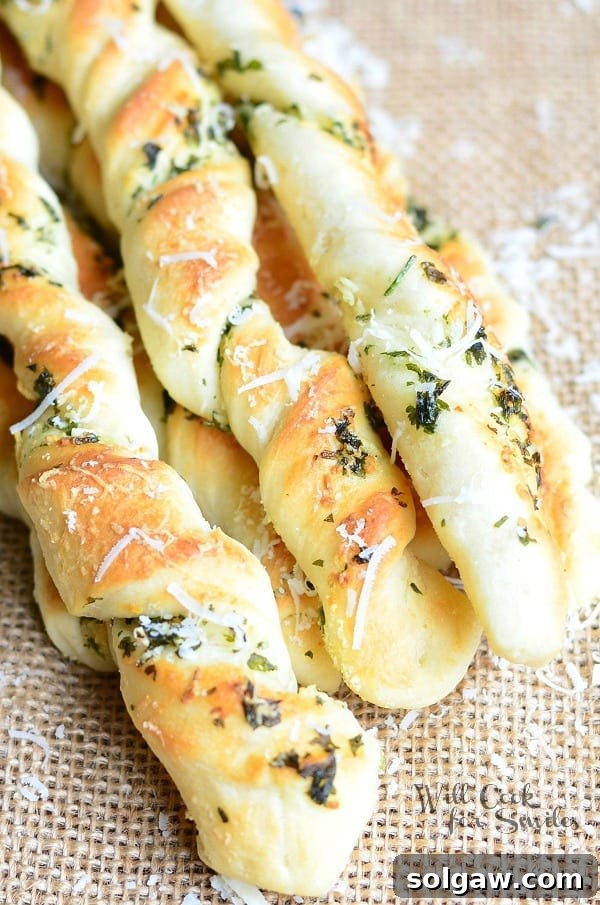 Homemade Parmesan Garlic & Herb Breadsticks - A perfect side dish for any meal.