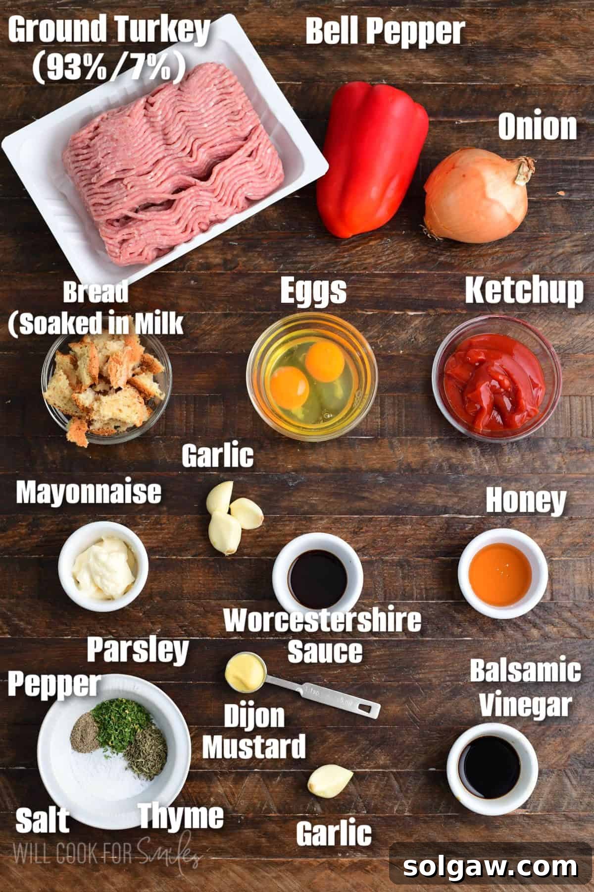 Labeled ingredients for turkey meatloaf on a wood surface.
