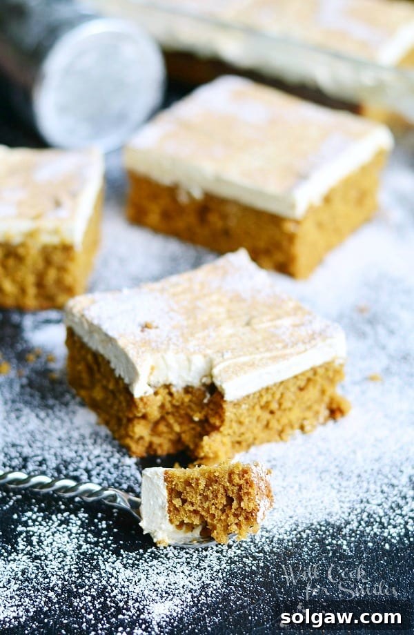 Finished Gingerbread Cake garnished with powdered sugar and cinnamon, ready to serve.
