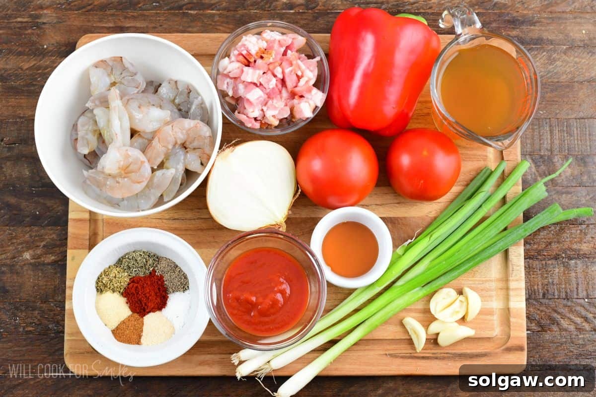 Bayou Shrimp and Rice 3 Fresh ingredients for Cajun shrimp and rice, including raw shrimp, chopped vegetables, and a mix of spices, arranged neatly on a wooden cutting board.