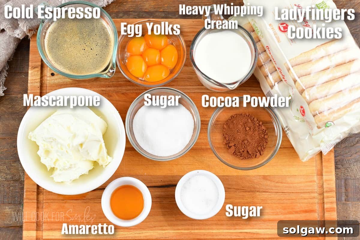 labeled ingredients for tiramisu on a cutting board.