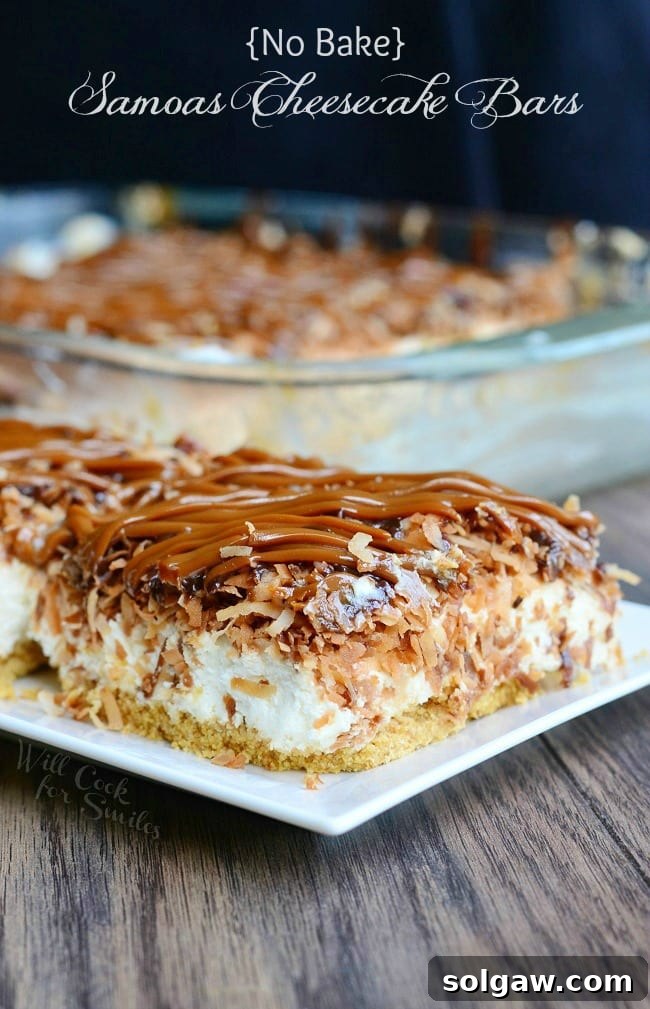 Samoas Cheesecake Bars with caramel and toasted coconut on top on a white plate