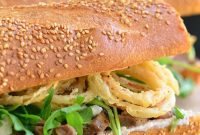 Gourmet Steak Sandwich: Blue Cheese, Arugula, and Crispy Onions