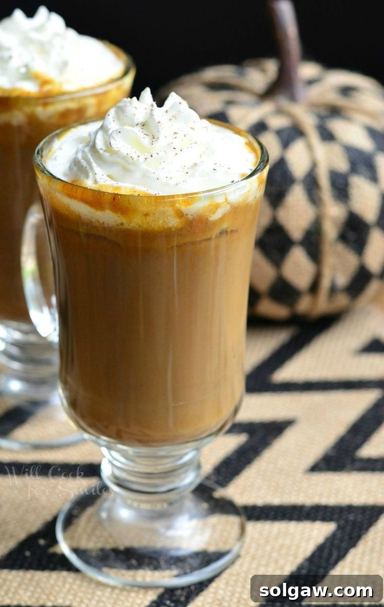 Autumn White Mocha Delight 9 Pumpkin White Chocolate Mocha Latte with whipped cream on top