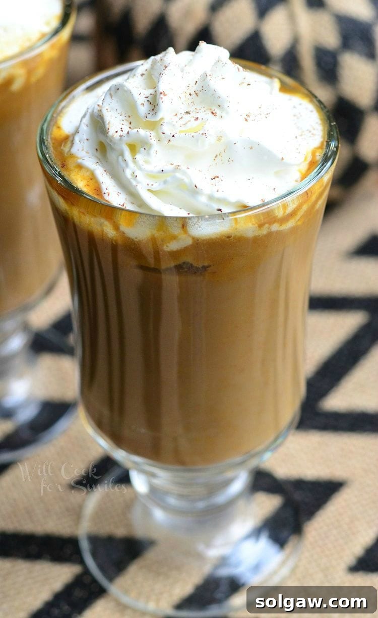 Autumn White Mocha Delight 5 Pumpkin White Chocolate Mocha Latte with whipped cream on top