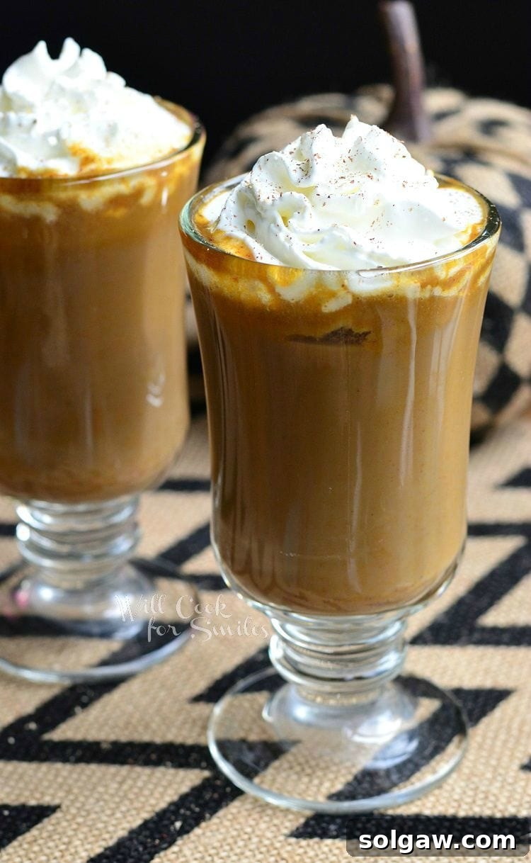 Autumn White Mocha Delight 8 Pumpkin White Chocolate Mocha Latte with whip cream on top