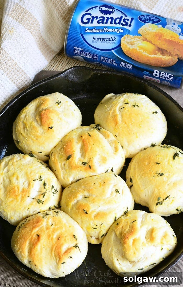 can of grands biscuits and Thyme Skillet Biscuits in a cast iron pan 